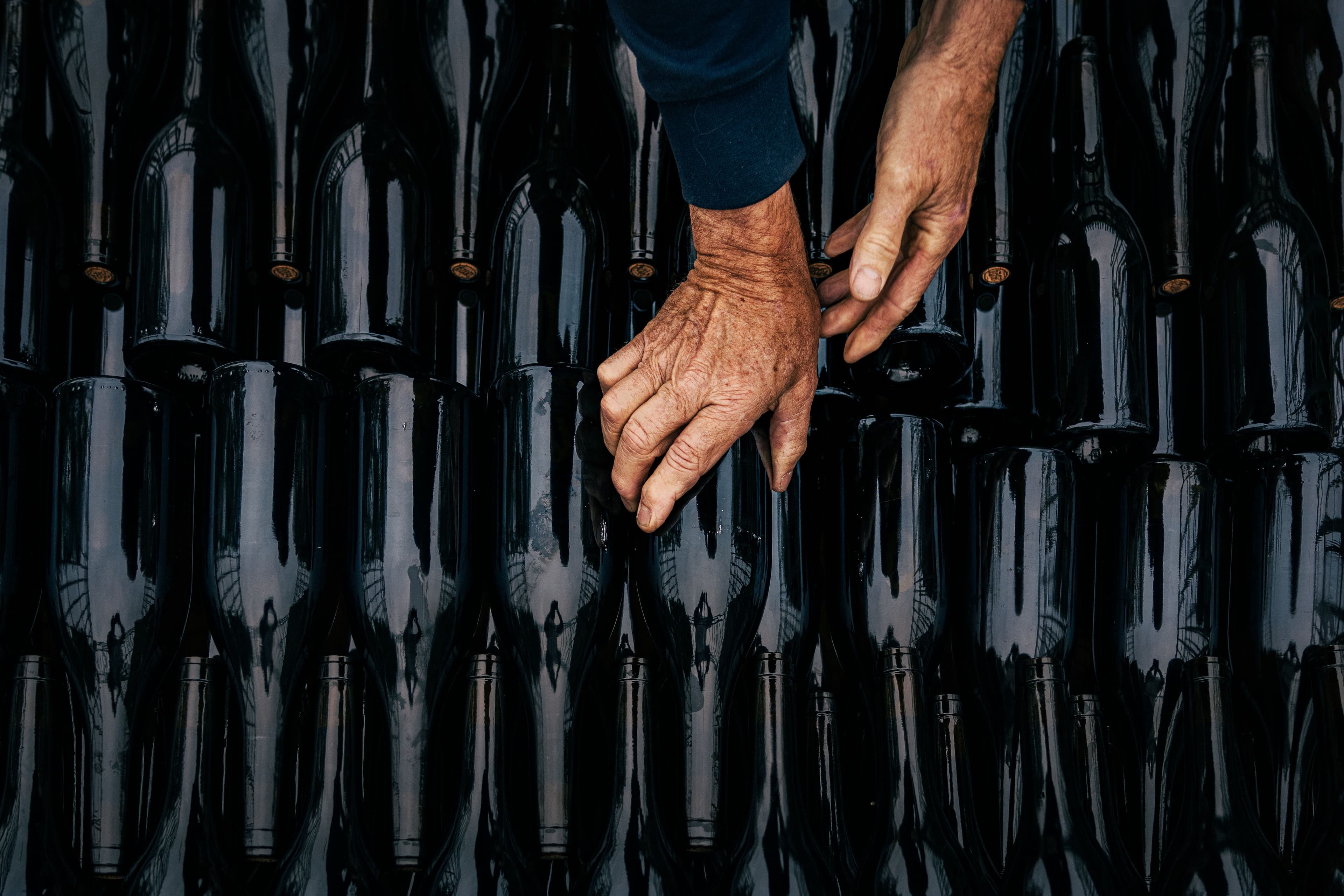 A producer working with their bottles